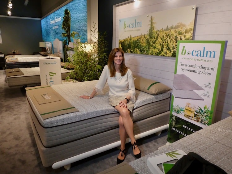 Therapedic's Susan Mathes with b-Calm bed