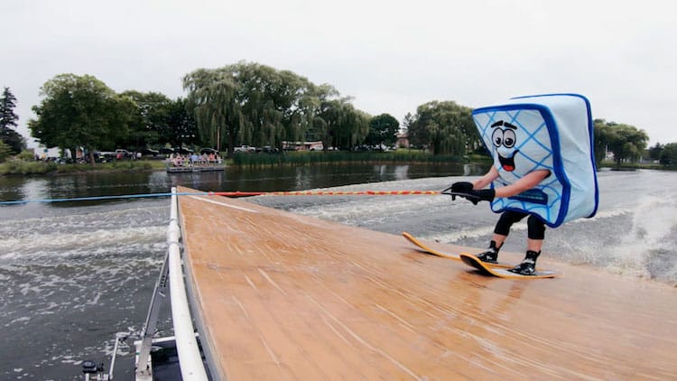 Verlo ad campaign shows Mattie the Verlo mascot trying to waterski