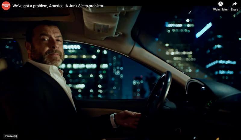 Liev Schreiber driving car at night in Mattress Firm Unjunk Your Sleep TV commercial