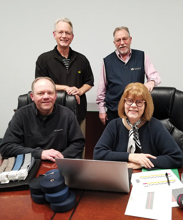 John Bailey, president and general manager; Dennis Ricketts, sales manager; Patsy Allen, design consultant and account manager; and Carl Carpenter, vice president of sales and marketing.