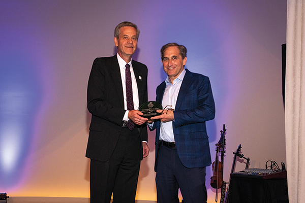 
ISPA President Ryan Trainer presented Richard Diamonstein, managing director of Paramount Sleep Co., with the Mattress Recycling Council’s Distinguished Service Award. Another new award this year, the honor is given to people or organizations committed to MRC’s growth and success. 