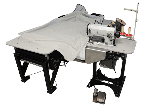 The Ultra HCB Ergo binding machine by GSG is designed
to join the thickest borders to quilt panels or nonwoven decking materials. Ergonomic features include an integrated air table and adjustable-height legs.