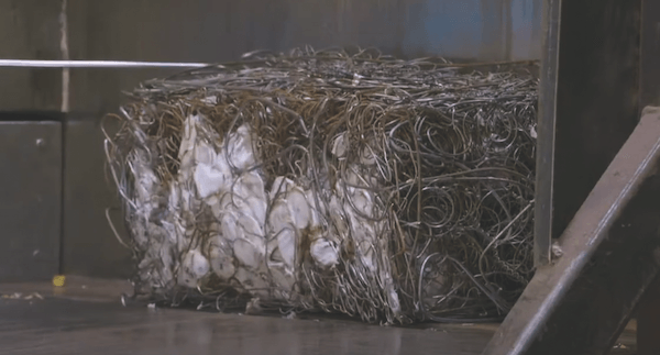 One of the few mechanized processes in most U.S. mattress recycling plants are the balers that compress components like steel. (Courtesy of MRC)