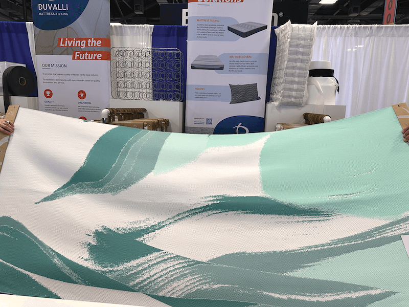 ISPA Innovation: Automation & Sustainability. The fabric pictured mimics the stability of woven ticking but has the softness of stretch fabric.