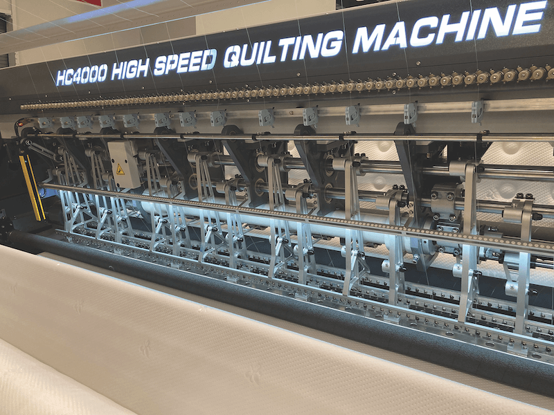 Hengchang Machine Factory showcased its HC4000, a high-speed, computerized, multineedle chain-stitch quilter that only requires one operator.