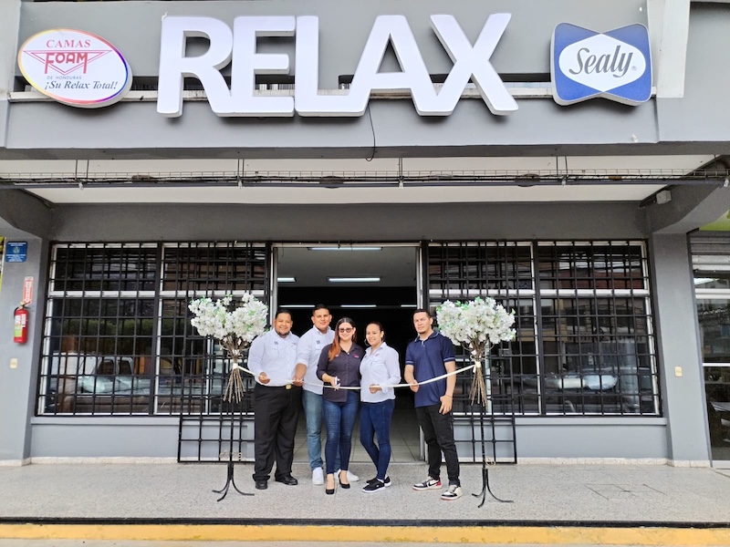 The Foam de Honduras marketing team cuts the ribbon at the grand opening of the company’s latest Relax-branded store in Honduras.