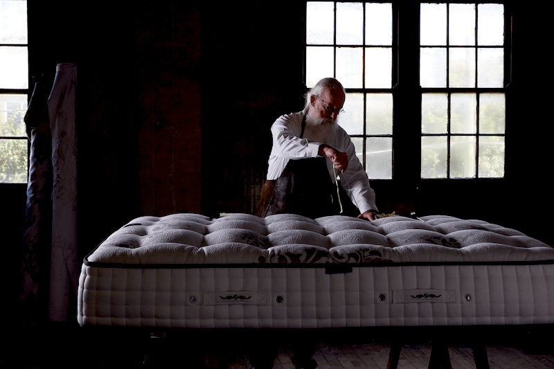 Neville Middleton, demonstrating the handcrafting of mattresses, is part of a valued workforce of 450 employees.