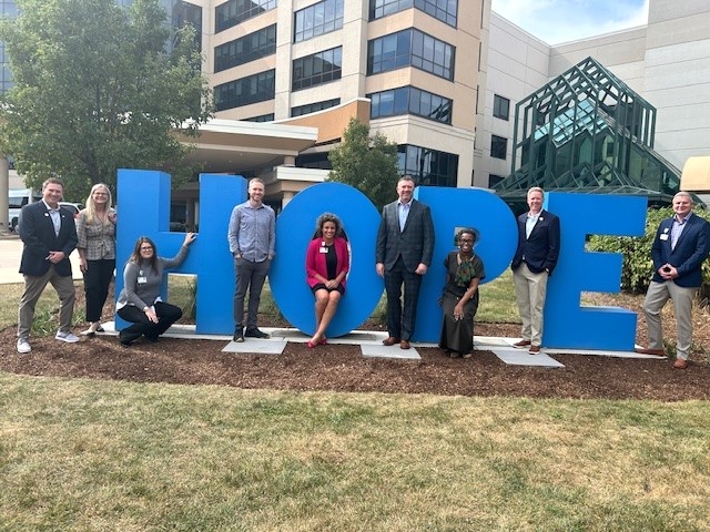 City Of Hope’s Industry Group Highlights Impact And Engagement With High Point Market Events. City of Hope's Zion, Illinois campus, pictured left to right: Cole Bawek, Ashley Furniture; Katie Doyle, City of Hope; Katie Easthon, City of Hope; Ryan Mahoney, Andmore; Angelina Fakhoury-Siverts, City of Hope; Will Harris, Darvin Furniture; Janita Pickett-Gordon, City of Hope; Tim Newlin, Norwalk Furniture and Pete Govorchin, City of Hope.