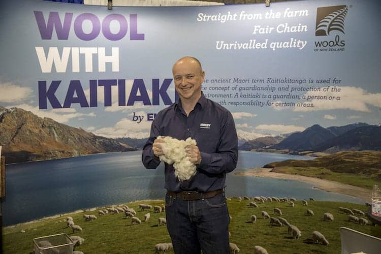 Enkev's Matt Dwyer holds wool from Wools of New Zealand growers cooperative