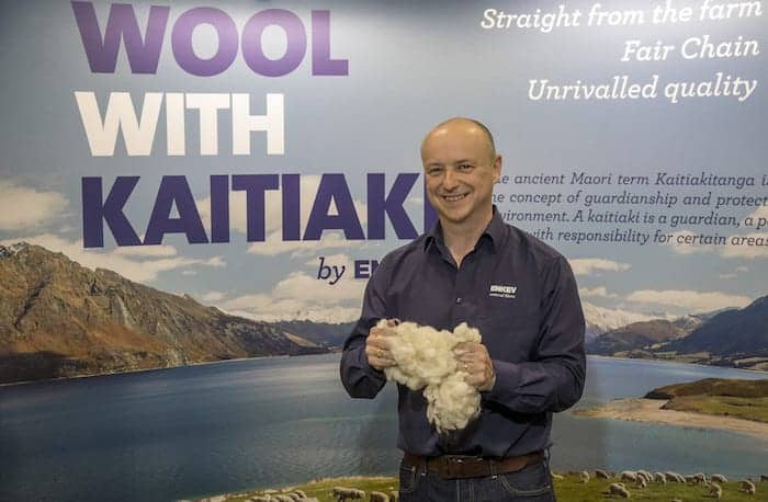 Matt Dwyer with Enkev holds natural wool grown in Australia