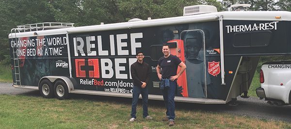 Scott Smalling (right), founder of Tacoma,Washington-based Relief Bed International, and company intern Jose Arreola are traveling around the country to raise awareness about homelessness and the importance of sleep.