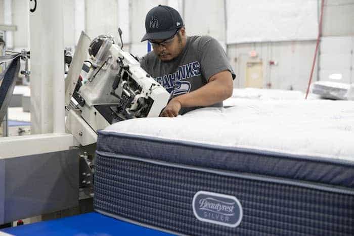 Serta Simmons plant in Seattle tape-edge closing operation in process