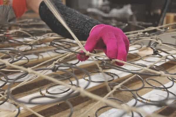 Shifman Mattress building an eight-way hand-tied box spring