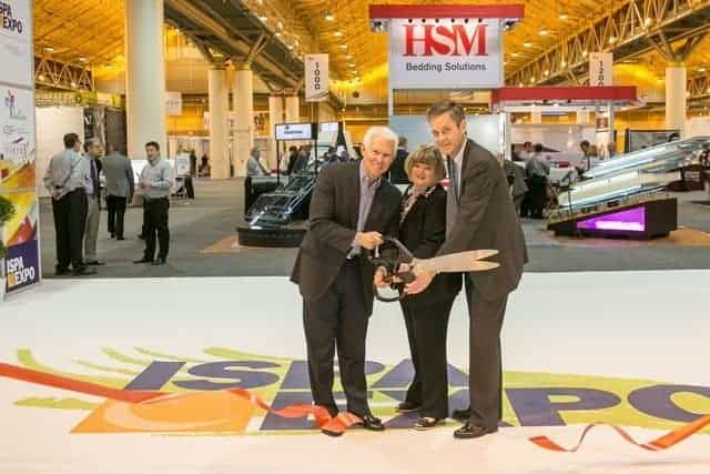 ISPA Chairman and Restonic President Ron Passaglia, ISPA Senior Vice President Catherine Lyons and ISPA President Ryan Trainer cut the ribbon on the show floor on opening day. 