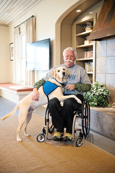 Marv Tuttle with his service dog Yara.