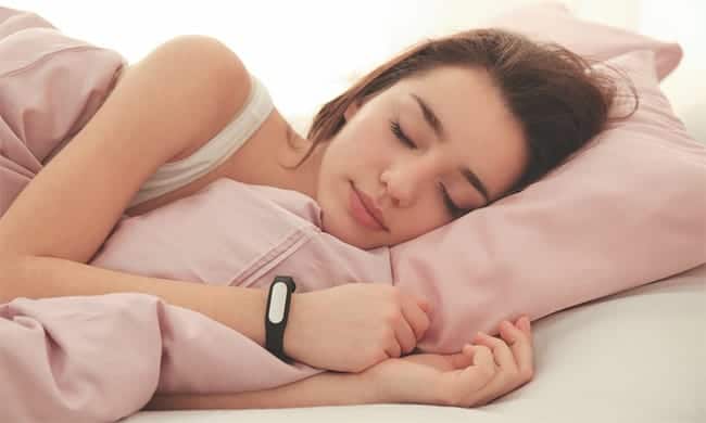 sleeping woman sleep tracker tracking sleep